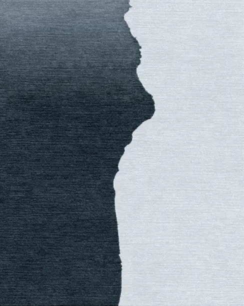 Soft gray and dark charcoal textured flooring sample, suitable for modern residential and commercial spaces.