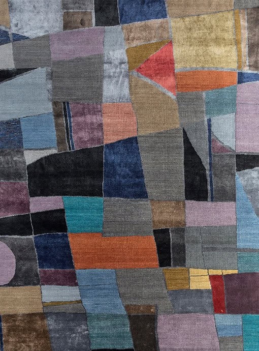 Colorful patchwork carpet with vibrant geometric patterns for stylish interior decor.