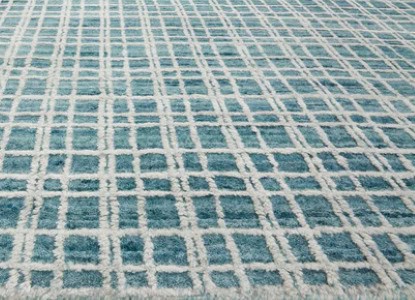 Modern blue and white patterned area rug from Creative Floors in Vail.