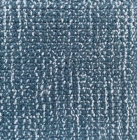 Premium blue textured carpet flooring for residential and commercial spaces.