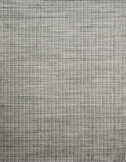 Soft textured fabric with a subtle checkered pattern, ideal for upholstery and interior decor.