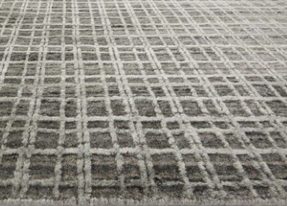 Luxurious patterned carpet with geometric design, ideal for residential and commercial spaces.