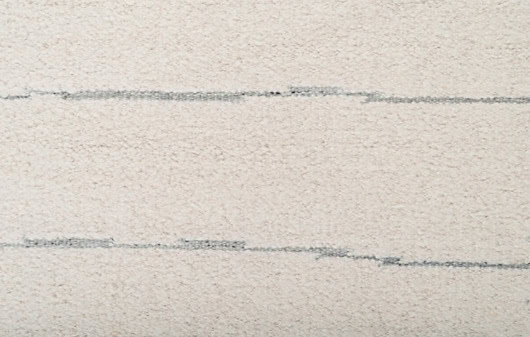 Soft beige textured wall with subtle horizontal lines, ideal for modern interior design.