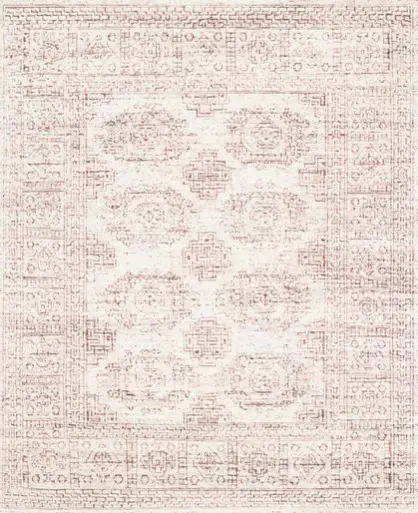 Luxury area rug with intricate traditional design, soft pastel pink tones, and modern aesthetic.
