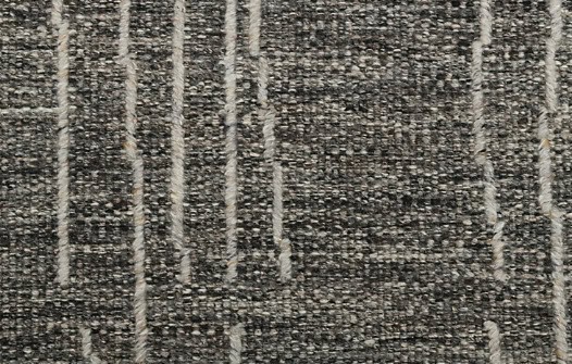 Durable commercial carpet flooring with textured black and gray pattern for business interiors.