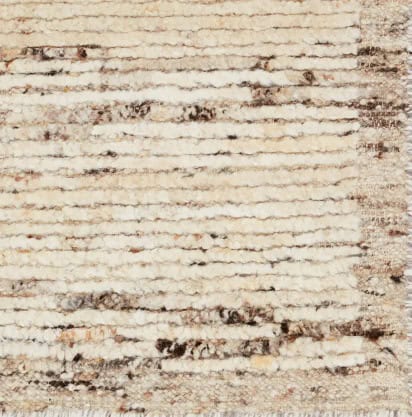 Weathered white brick wall with rustic charm, ideal for interior or exterior design projects.