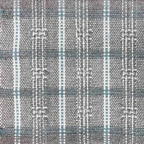 Soft textured plaid outdoor fabric for commercial and residential upholstery.