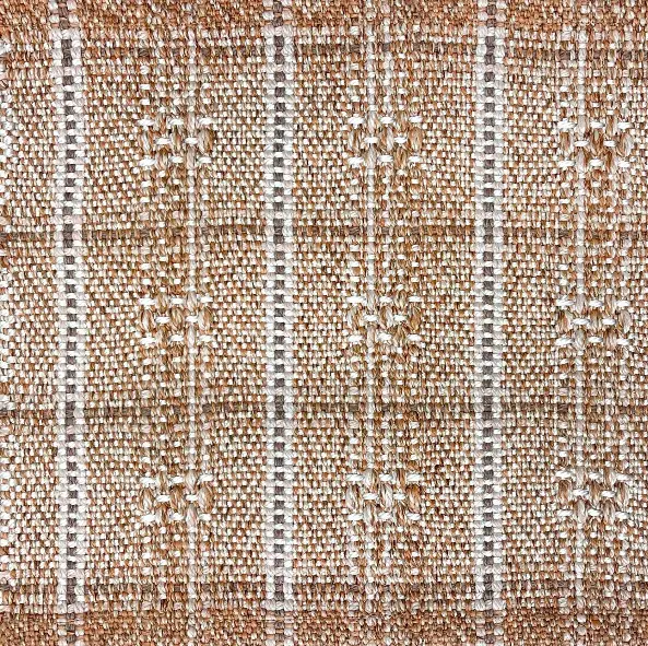 Soft beige textured woven carpet with floral pattern, ideal for elegant indoor flooring.