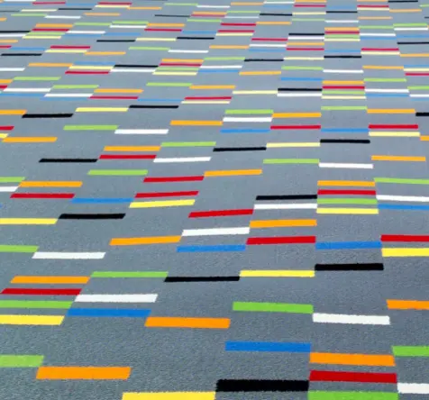 Colorful patterned carpet with geometric design for modern commercial flooring solutions.