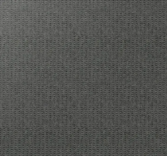 Soft gray commercial carpet flooring with durable loop pile for professional interiors.