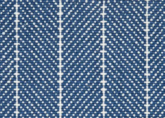 Vibrant blue textured carpet with a modern dotted geometric pattern for interior flooring.