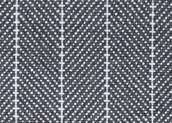 Soft gray and white patterned carpet with geometric design, ideal for upscale interior flooring solutions.