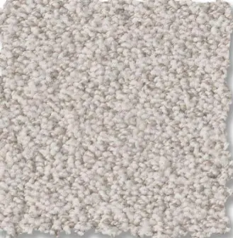 Luxurious beige plush carpet with soft, dense fibers for home or commercial flooring.
