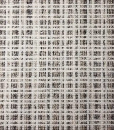 Textured white and black checkered flooring pattern from Creative Floors in Vail.