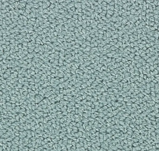 Luxurious light blue carpet with plush texture for home and commercial flooring.