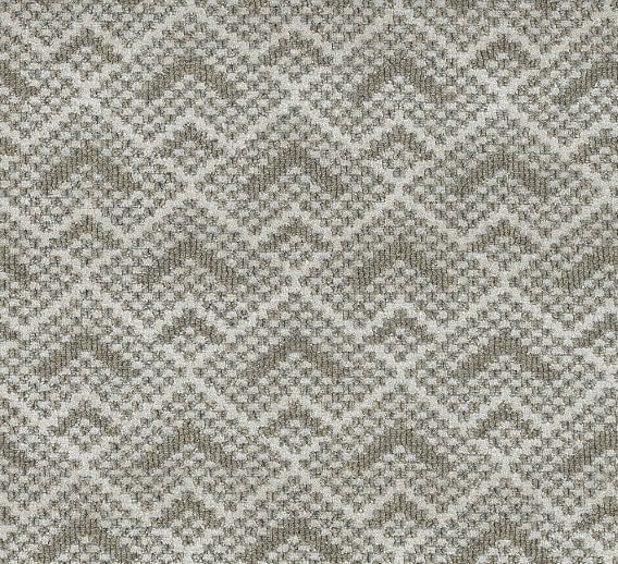 Soft beige and gray patterned carpet ideal for residential and commercial flooring solutions from Creative Floors.