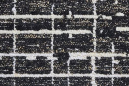 Black and white textured brick floor for modern interior design and durable flooring solutions.
