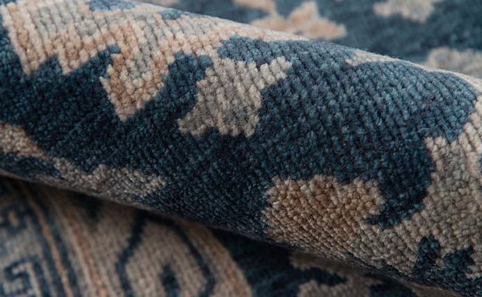 Soft woven area rug with traditional pattern, ideal for home flooring in Vail.