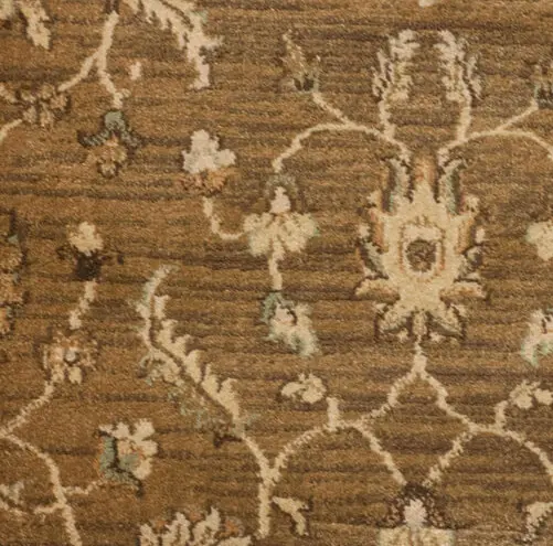 High-quality traditional patterned carpet with floral design in warm earth tones.