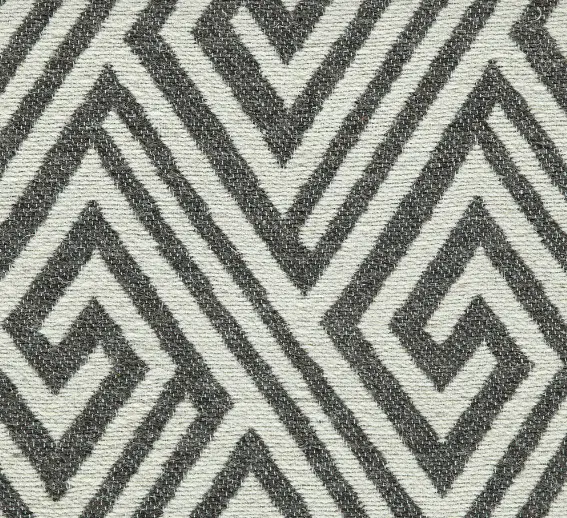 Intricate black and white geometric patterned rug for modern interiors.