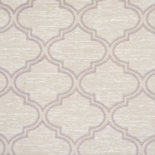Cream and gray Moroccan-inspired patterned flooring with a textured finish.