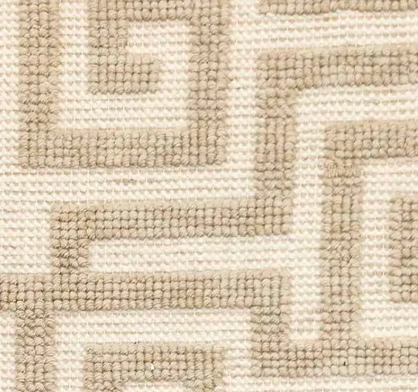 Textured beige geometric carpet close-up for interior flooring design.