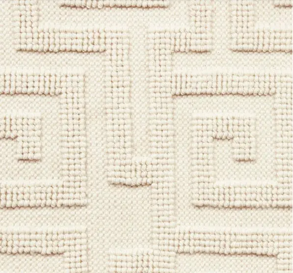 Plush beige textured area rug for modern home decor, handcrafted for warmth and style.