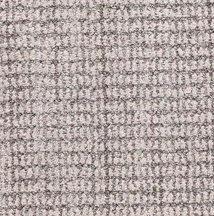 Aspen - Silver Cream and gray textured carpet close-up showcasing durable and stylish flooring options.
