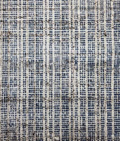 Vibrant blue and beige patterned area rug with modern geometric design for living room or bedroom.