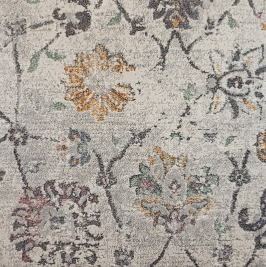 Intricate floral patterned rug showcasing high-quality craftsmanship by Creative Floors.