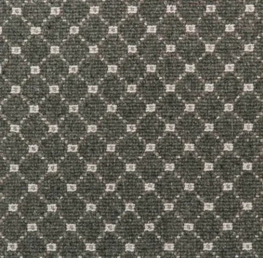 Carpet sample with geometric pattern in neutral colors, ideal for commercial flooring projects.