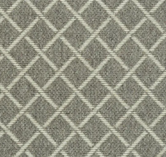 Soft beige and gray geometric patterned carpet with diamond shapes, ideal for elegant interior flooring.