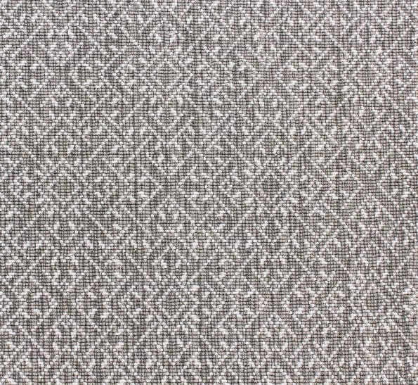 Intricate patterned beige and brown carpet for stylish interior flooring.