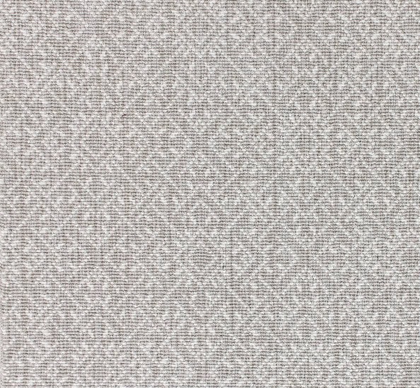 Cream textured carpet flooring for residential and commercial spaces.