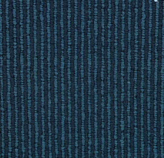Blue textured carpet with striped pattern, ideal for commercial and residential flooring solutions.
