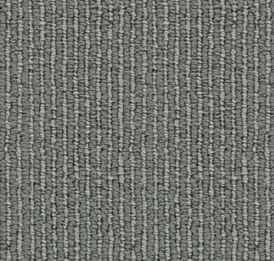 Modern gray commercial carpet flooring with textured loop pile design.