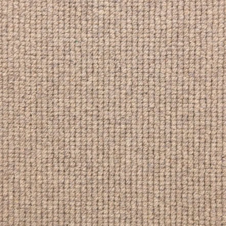 Soft beige textured carpet with durable, high-quality woven fibers.