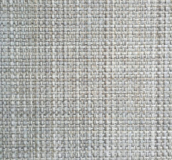 Textured woven fabric close-up showcasing durable and stylish flooring options from Creative Floors.