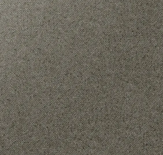 Textured taupe carpet flooring for residential or commercial spaces.