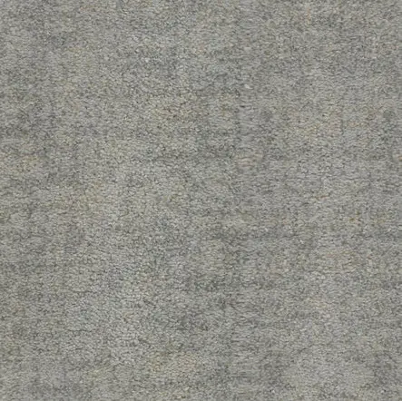 High-quality textured carpet with neutral gray tones for residential or commercial flooring solutions.