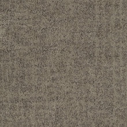 Textured beige carpet flooring in a residential space, showcasing durable and stylish design.