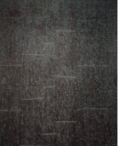 Dark textured flooring with wood grain pattern, ideal for modern interior design.