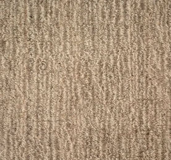 Cream textured carpet flooring with durable fibers for residential and commercial spaces.