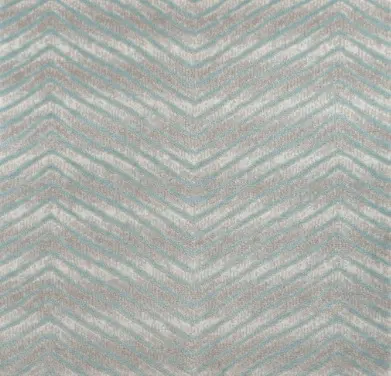 Soft beige and light blue chevron patterned rug for stylish interior decor.
