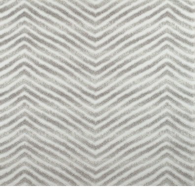 Elegant chevron-patterned area rug in neutral tones, perfect for modern interior design.