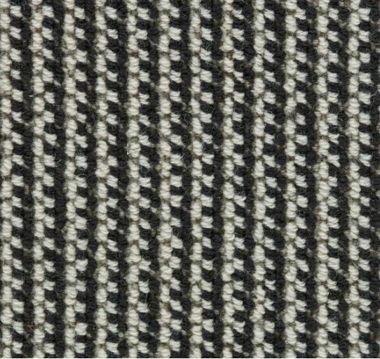 Black and white striped textured carpet for commercial and residential flooring solutions.