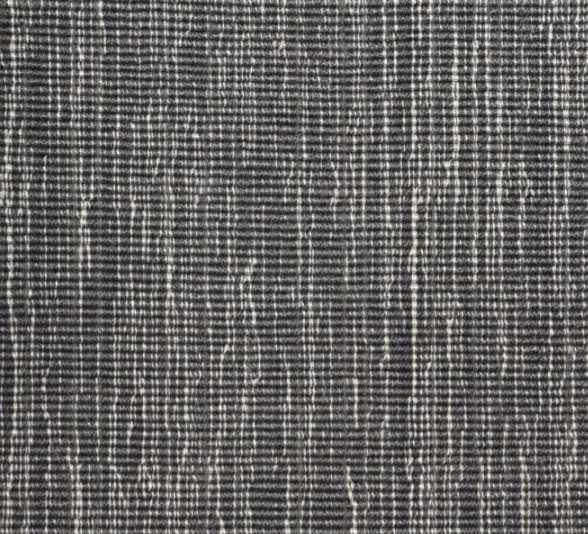 Plaid fabric upholstery with black, white, and gray tones, perfect for modern interior decor.
