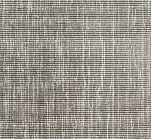 Cream and beige textured woven carpet showcasing durable luxury flooring options in Vail.