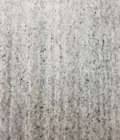 Concrete floor surface with a textured finish for durable residential and commercial flooring solutions.