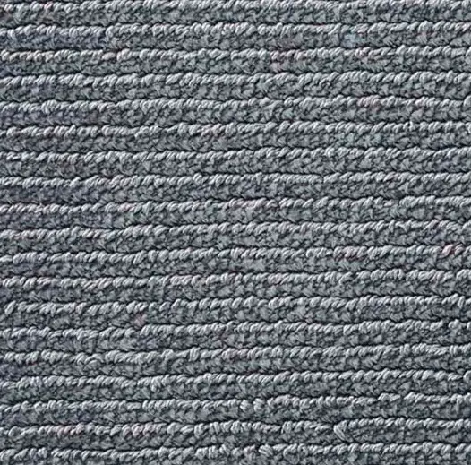 Close-up of textured gray commercial carpet, ideal for professional flooring solutions.